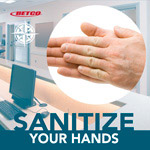 Sanitizing hands in office poster